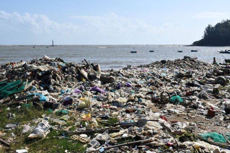 big plastic trash pile next to Quang Ngai beach, Vietnam